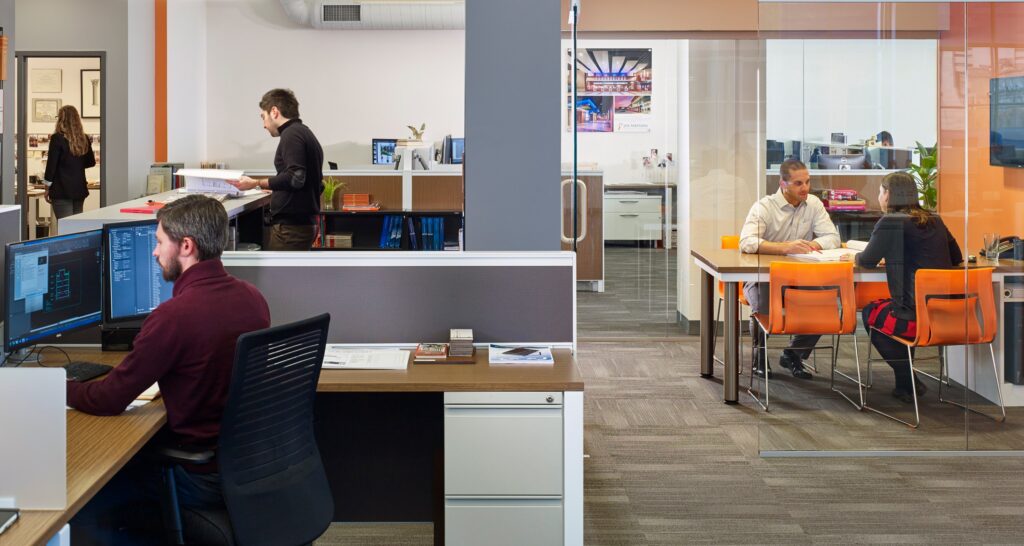 JKRP Office photo of employees working